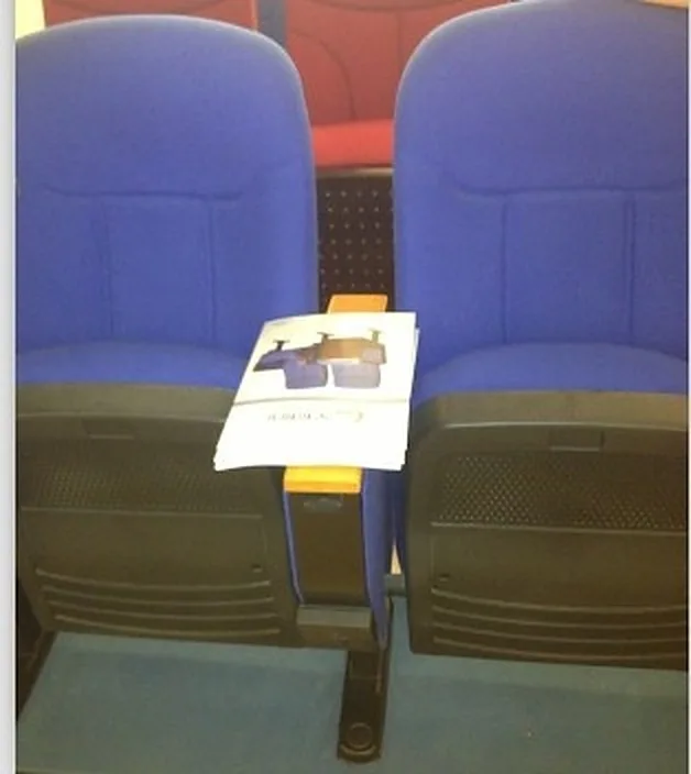 Folding theatre seat
